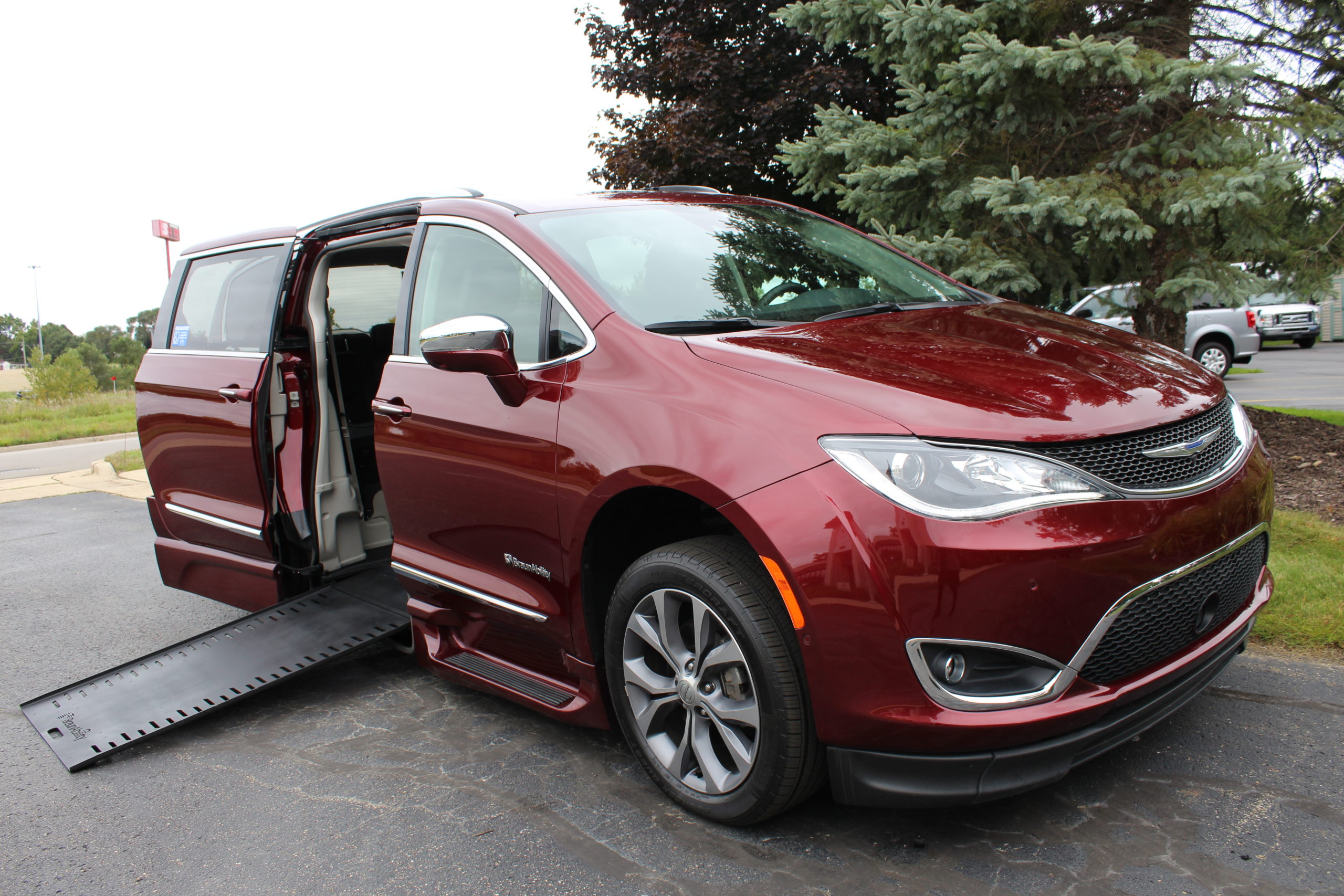 2019 Velvet Red Chrysler Pacifica Limited with BraunAbility Infloor Conversion