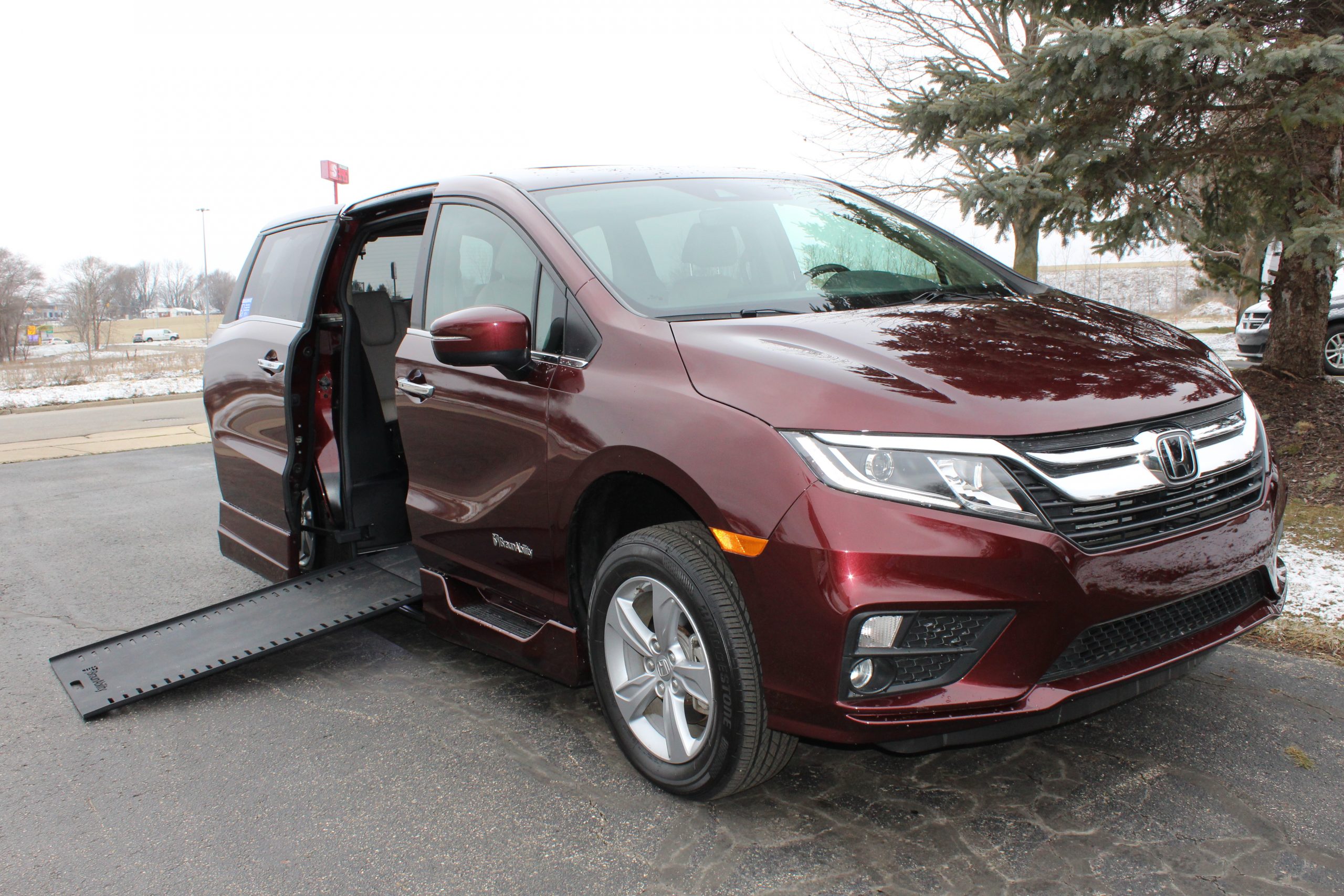 2020 Deep Scarlet Pearl Honda Odyssey EX-L with a BraunAbility XI Conversion with rubber