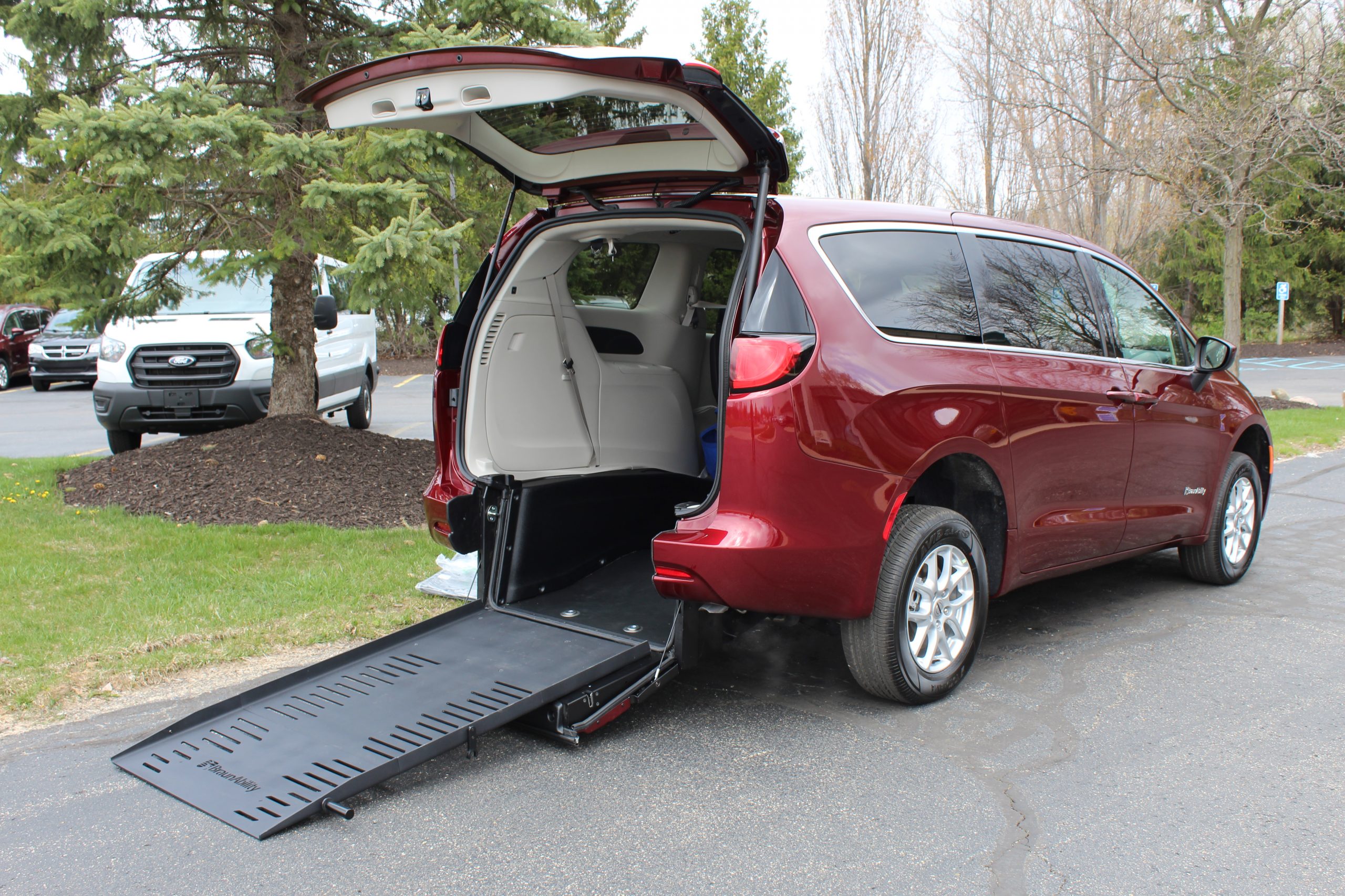 2022 Velvet Red Chrysler Voyager LX with BraunAbility Rear Entry Conversion