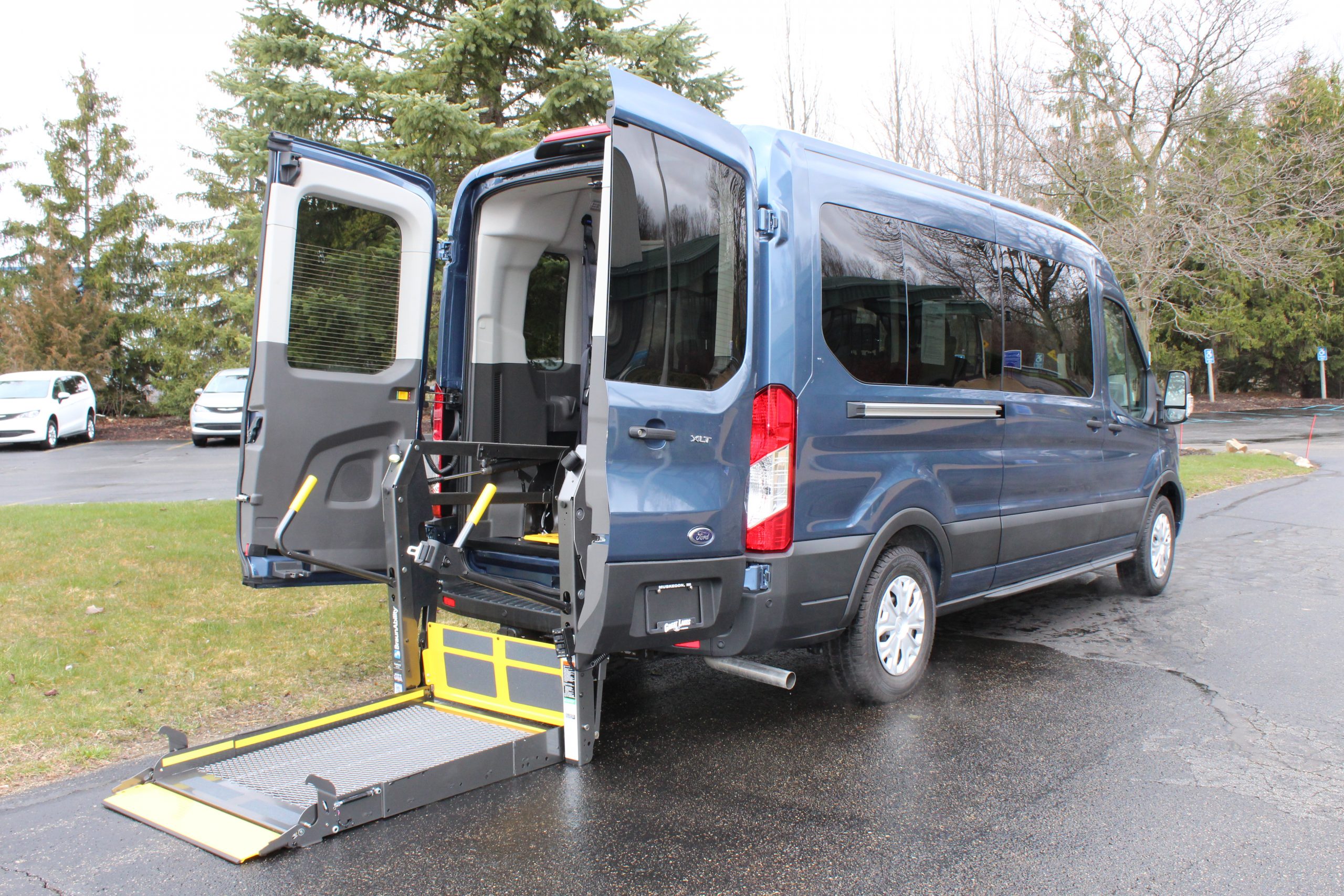 2023 Blue Metallic Ford Transit T350 MR XLT AWD with A&J Rear Entry Conversion