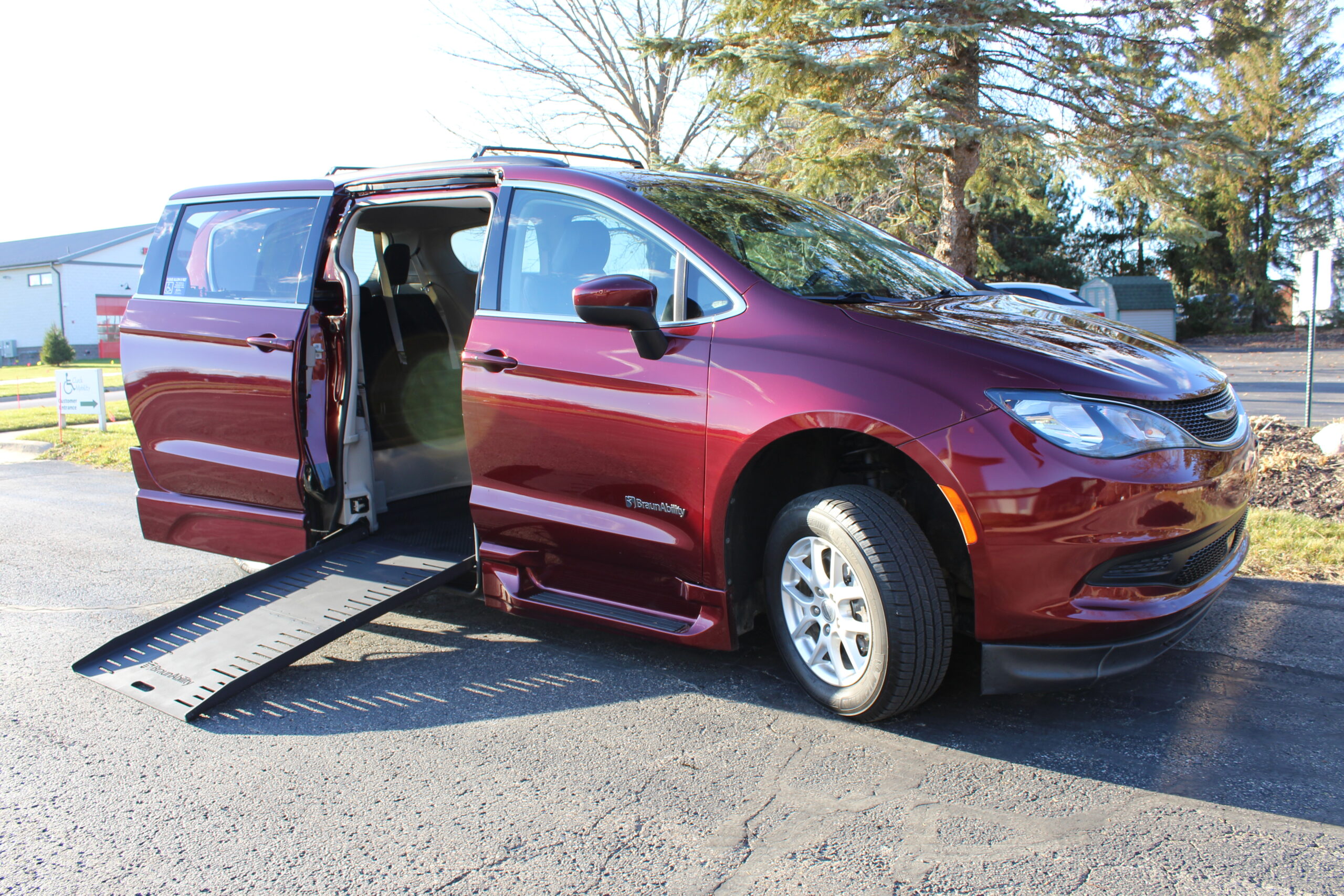 2021 Velvet Red Chrysler Voyager LXI with BraunAbility Power Foldout XT Conversion